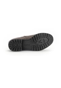Brown shoe sole with deep tread for traction, featuring a textured black rubber material and the Gabor logo embossed on the side.