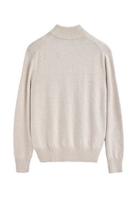 Maglione beige chiaro con colletto alto, polsini e orlo a costine, realizzato in morbido tessuto a maglia, caratterizzato da una vestibilità rilassata e maniche raglan.