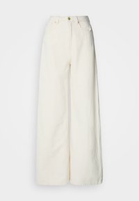 Kalhoty s širokými nohavicemi z lehké látky v barvě slonové kosti. Mají vysoký pas, přední kapsy a zapínání na knoflíky.