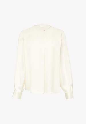 Krēms krāsas blūze ar garām piedurknēm, apokšņu kaklu un vienu pogu aizdari augšējā priekšpusē, brīvs griezums un piedurknes ar aprocēm.