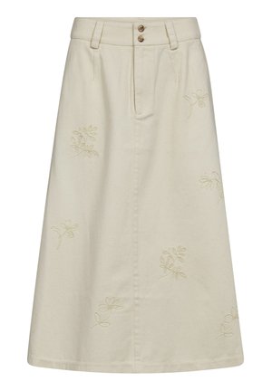 Cremefarvet A-line nederdel med bæltestropper, to brune knapper ved linningen og diskret blomsterbroderi spredt på stoffet.