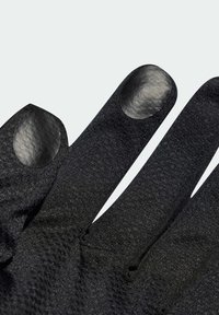 Black textile gloves featuring textured fabric and leather accents on fingertips, designed for grip and dexterity.