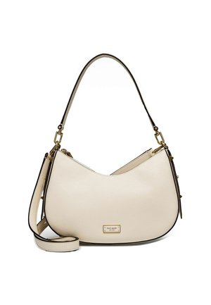 Borsa a tracolla in pelle beige con design curvo, bordature nere e dettagli in metallo dorato. Presenta una tracolla e una superficie texture.