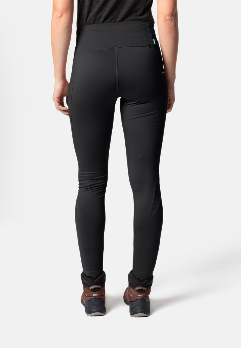 Schwarze Leggings mit hoher Taille, glatter Textur und figurbetontem Design. Enthält dezente Nahtdetails und eine schmal zulaufende Beinform.