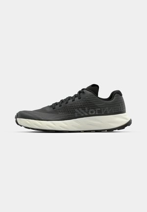 Black running shoe with a textured upper, featuring a white, cushioned midsole and black outsole. Design includes a logo on the side.