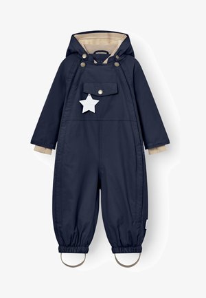 Marineblåt børnedragt med hætte, beige foret inderside, forlomme med knap, elastiske manchetter og fastsatte fodstropper.