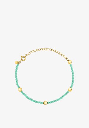 Pulsera chapada en oro con cuentas de turquesa. Presenta una cadena enlazada y detalles dorados, combinando formas redondas y ovaladas.