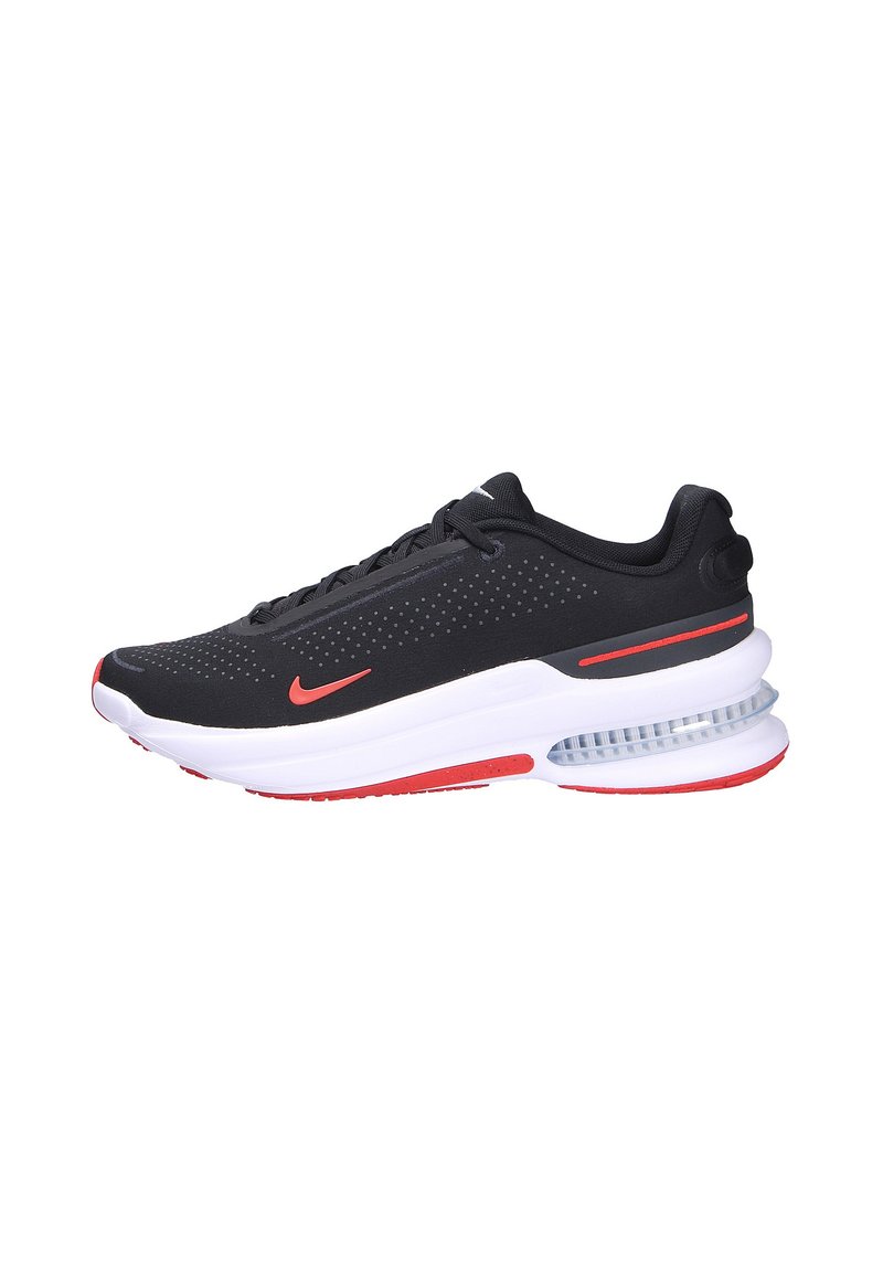 Zapatillas deportivas negras con parte superior texturizada, acentos rojos y amortiguación de aire visible en la suela. Presenta un diseño perforado y cordones.