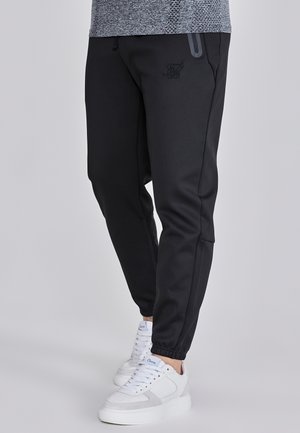 SIKSILK TAPERED - Tracksuit bottoms - black