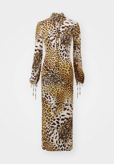 Leopard print dress with a collared neckline, long sleeves with drawstring cuffs, and a flowing silhouette in shades of brown and cream.