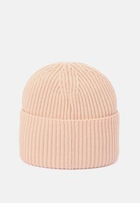 Rosa stickad viss mössa med ribbad struktur och vikbar kant, med en sömlös topp och mjukt tyg för värme.