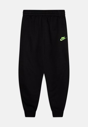 Sorte Nike træningsbukser med elastisk talje og manchetter, med lille neongrønt Nike-logo på øverste venstre lår.