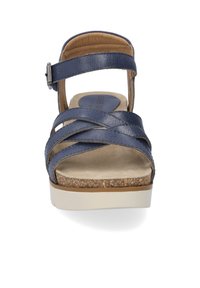 Navy blue sandal with crisscross leather straps, adjustable ankle buckle, cushioned footbed, and a cork-textured platform.