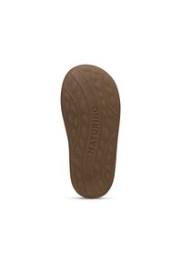 Hnědá gumová podešev s texturovaným povrchem, který má kruhové a vlnité vzory. Na podešvi je vyražený nápis "NATURINO".