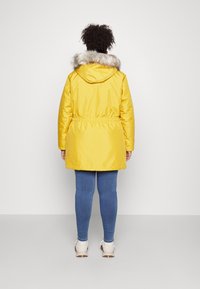 ONLY Carmakoma CARIRENA COAT - Parka - tawny olive
