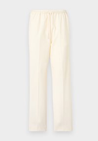 Παντελόνια κρεμ σε ίσια γραμμή με ελαστική μέση και κορδόνι, παρουσιάζονται σε απλό φόντο.