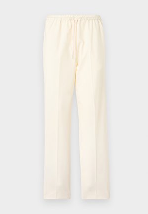 Pantalon droit couleur crème avec taille élastique et cordon de serrage, présenté sur un fond uni.