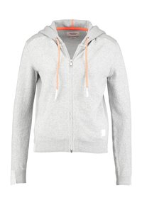 Jasnoszara bluza z kapturem na zamek, wykonana z miękkiego materiału, z pomarańczowymi sznurkami, ściągaczami na rękawach i białą naszywką z logo.