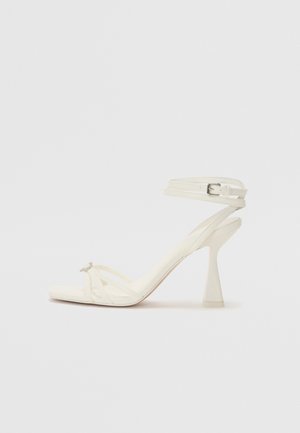 High heeled sandals - white