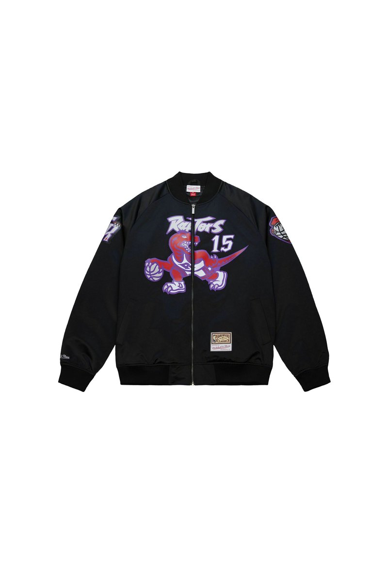 Giacca nera con zip, decorata con il logo del dinosauro dei Toronto Raptors che tiene un pallone da basket e il numero 15, con una patch dei NBA Hardwood Classics.