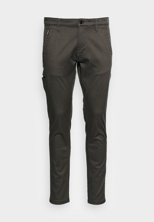 Mörkgröna chinos med slim fit. Har knappstängning, framfickor och en sidficka. Slät tyg med en något glänsande ytstruktur.