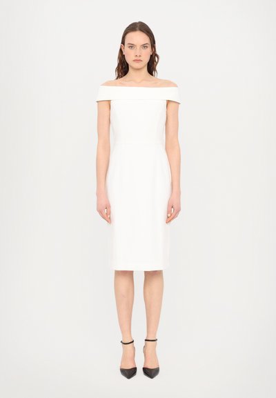 White off-the-shoulder dress with a fitted silhouette and knee-length hem. Smooth fabric with minimal seams and no visible patterns.