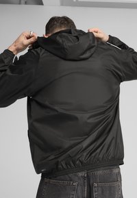 Puma SPORT  - Windbreakers - black