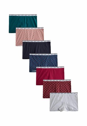 Seven pairs of men's boxer briefs in different colors and patterns arranged in a diagonal line on a white background.