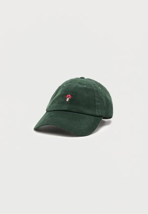 Dark green corduroy baseball cap with small red and white mushroom embroidery centered above the brim.