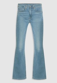 Jeans acampanados de color azul claro hechos de mezclilla. Incluyen cinco bolsillos, un cierre de cremallera y patrones de desvanecimiento a lo largo de las piernas.