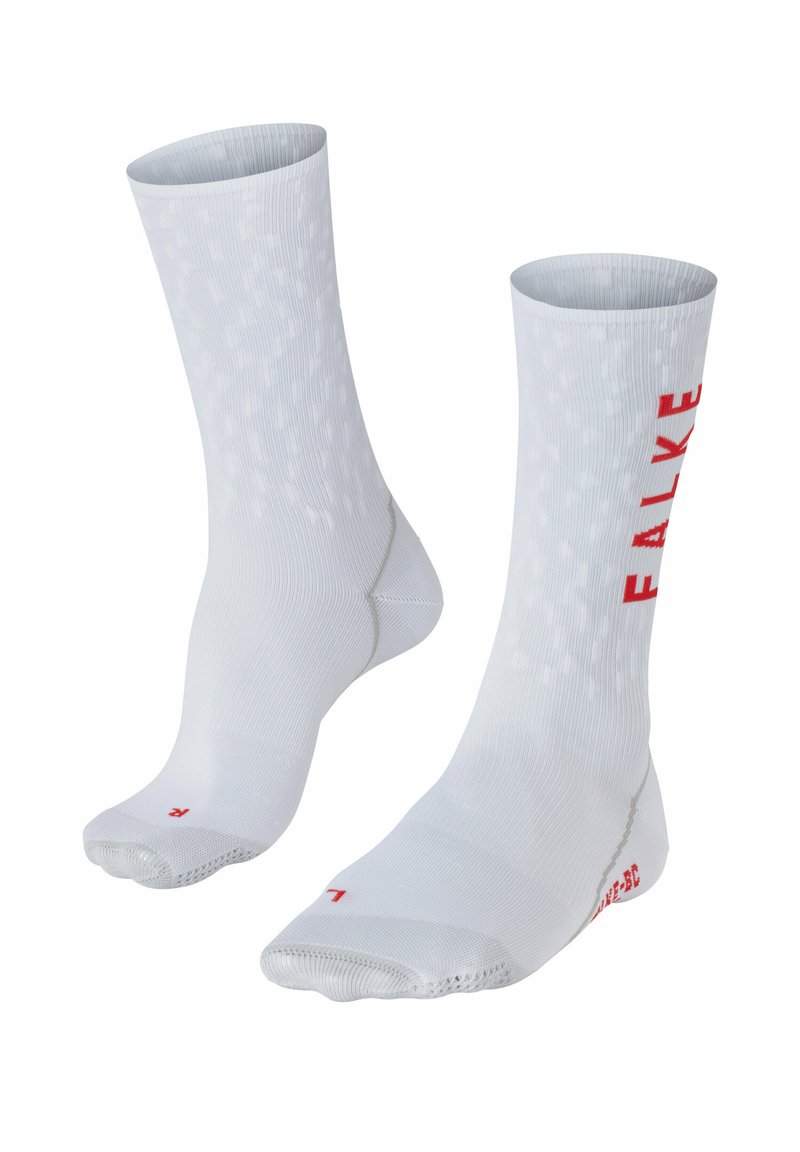 Weiße Sportsocken mit geripptem Textur, gepunktetem Muster und rotem "FALKE"-Logo. Knöchellanges Design mit verstärkter Zehen- und Fersenpartie.