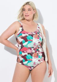 Maillot de bain une pièce avec un motif coloré en mosaïque présentant des nuances de rose, de bleu-vert et de marron. Matière douce avec des bretelles larges et un décolleté rond.