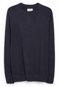 Mörkblå stickad tröja med ett strukturerat mönster, rundad hals och raglanärmar. Avslutad med ribbade mudd och nederkant. Enkel och mångsidig design.