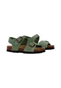 Le sandali in suede verde presentano un design open-toe, doppie cinghie con fibbie regolabili e una suola in sughero marrone. Suola in gomma testurizzata.