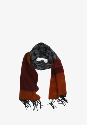 Mehrfarbiger Schal mit einem Hahnentrittmuster in Grau und Schwarz, ergänzt durch bordeauxfarbene und orangefarbene Abschnitte, mit schwarzen Fransen.