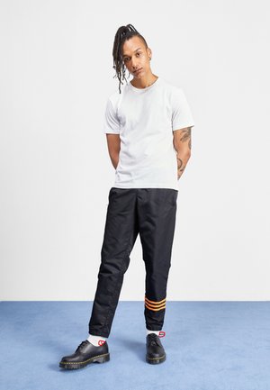 adidas Originals Pantaloni sportivi - black/orange