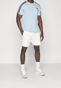 adidas Sportswear Sportovní kraťasy - off-white