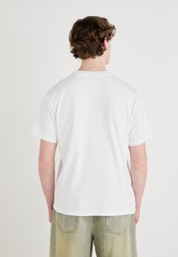 Levi's® VINTAGE FIT GRAPHIC - Marškinėliai su spaudiniu - bi eagle white
