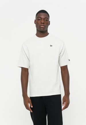 Light gray short-sleeve t-shirt made from cotton, featuring a round neckline and a small black logo on the left chest area.