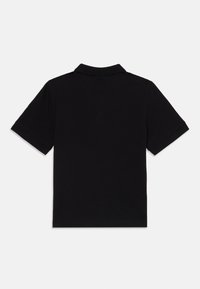 Svart polo skjorte med klassisk krage og korte ermer, med en glatt bomullstekstur og et rent, minimalistisk design.