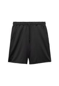 Pantalones cortos negros de tela suave, con una cinturilla elástica y cordón, y dos bolsillos laterales, en un diseño de corte relajado.