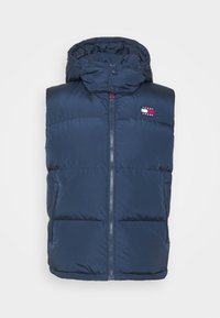 Granatowa puchowa kamizelka z kapturem, zapinana na zamek z przodu, z dwoma bocznymi kieszeniami i naszywką z logo na górnej lewej stronie klatki piersiowej.