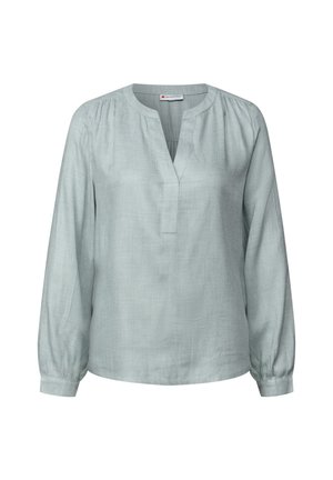 Blouse vert clair à manches longues avec un col en V et des détails froncés. Fabriquée en tissu doux, avec une coupe décontractée et des poignets élastiques.