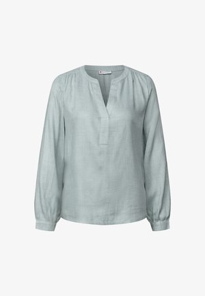 Blouse vert clair à manches longues avec un col en V et des détails froncés. Fabriquée en tissu doux, avec une coupe décontractée et des poignets élastiques.