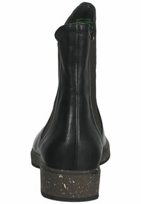 Schwarze Leder-Stiefelette mit elastischen seitlichen Einsätzen und einer strukturierten, gesprenkelten braunen Sohle. Abgerundete Zehenpartie und glatte Oberfläche.