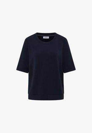 Laine navy sininen lyhythihainen paita, joka on valmistettu pehmeästä kankaasta. Pyöreä kaula-aukko, rento istuvuus ja yksivärinen. Minimalistinen muotoilu ilman kuvioita.