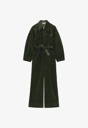 Olive green corduroy jumpsuit with long sleeves, front zipper, a waist tie, a patch pocket, and wide legs. Soft texture and structured design.