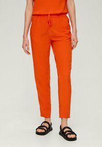 s.Oliver Tracksuit bottoms - dunkelorange