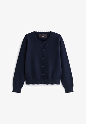 Cardigan bleu marine à manches longues boutonné avec des bords festonnés au niveau de l'encolure, des poignets et de l'ourlet, étiqueté "next school."