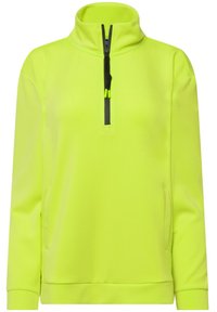 Sudadera con media cremallera en amarillo neón, confeccionada en una tela suave, con cuello alto, cremallera negra y dos bolsillos laterales.